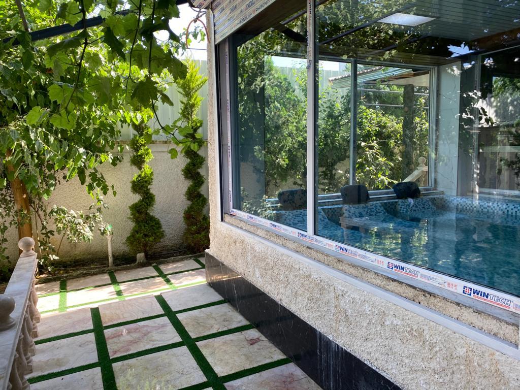 عمارت هشت خوابه سبز با پارك آبى