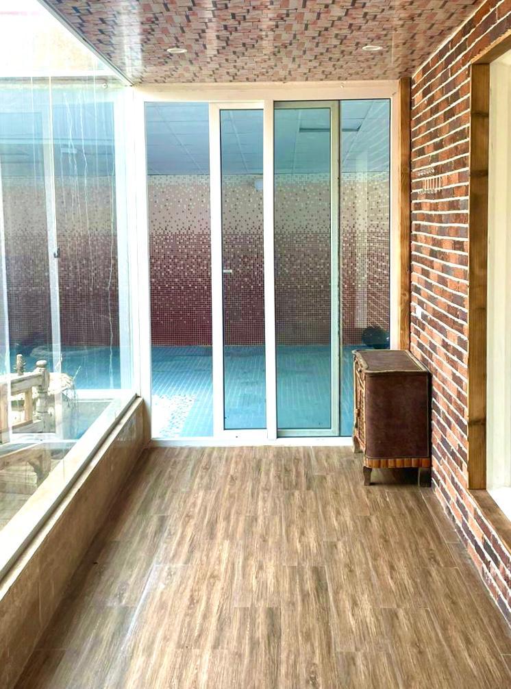 ویلا باغ لوکس با استخر سرپوشیده در بلوار کوهسار