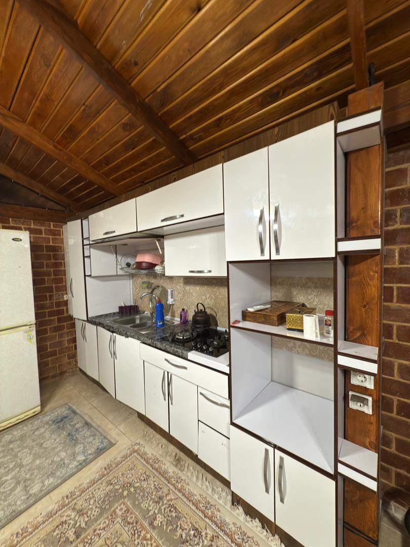 کلبه چوبی با استخر آب گرم در خان زنیان