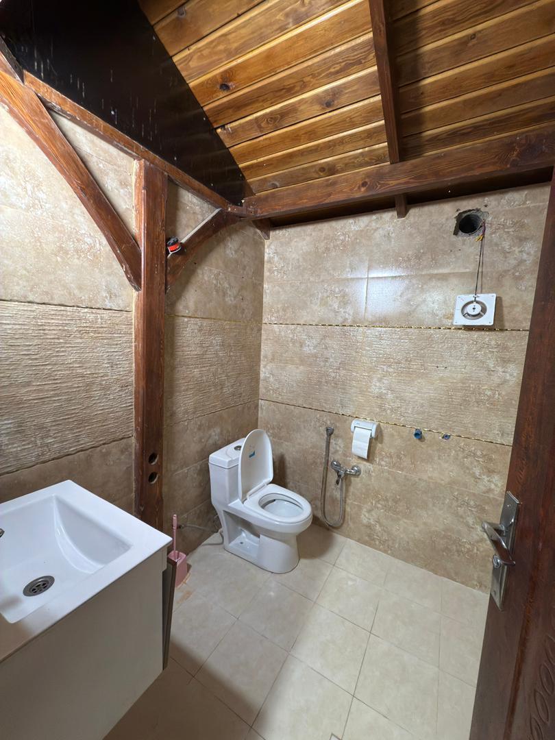 کلبه چوبی با استخر آب گرم در خان زنیان