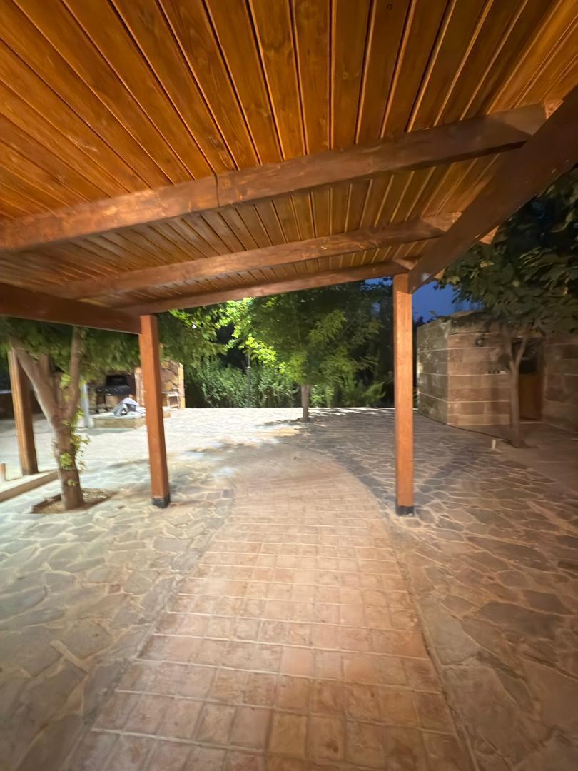 کلبه چوبی با استخر آب گرم در خان زنیان