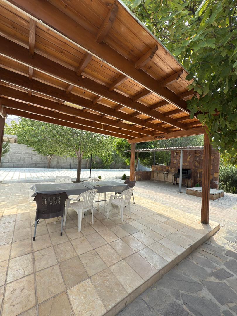 کلبه چوبی با استخر آب گرم در خان زنیان