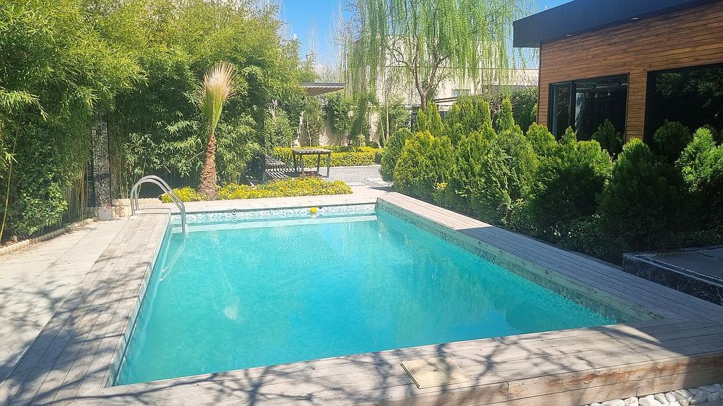 ویلا باغ سرسبز استخردار اب گرم