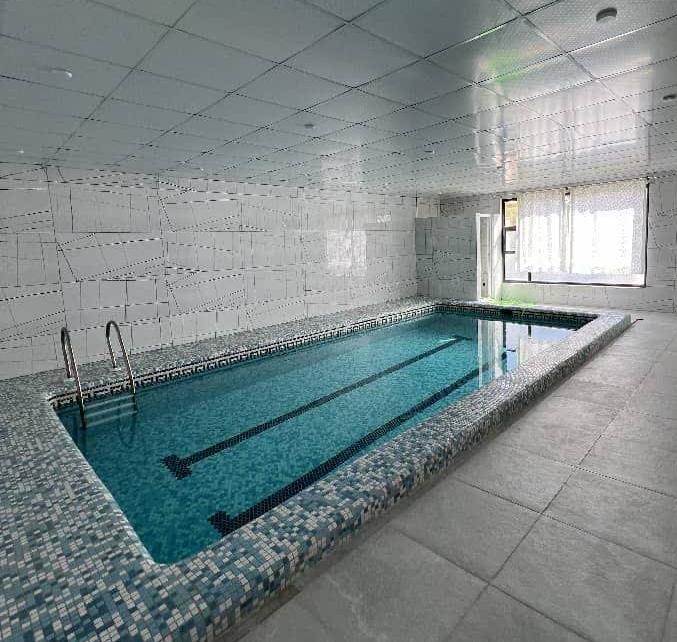 باغ ویلا استخردار هلیا در ملارد